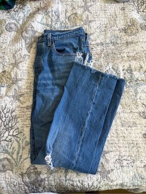 Levi's Women's Straight-Leg Jeans in Medium Blue with Frayed Hem